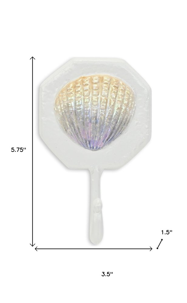 4" Cream And Pearl Cast Iron Seashell Wall Hook. Coat hanger isolated on a plain white background, showing a cream metal surface.