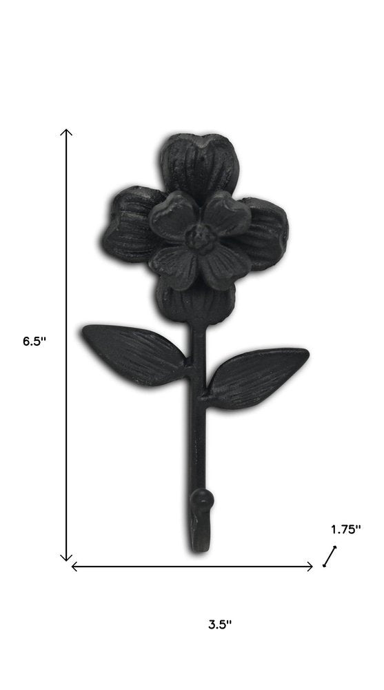 4" Black Cast Iron Flower Wall Hook. Coat hanger isolated on a plain white background, in a black metal finish.