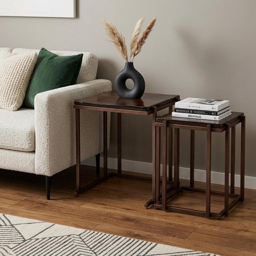 Set of Two Bronze Glass and Iron Square Frame Nested Tables in a home interior