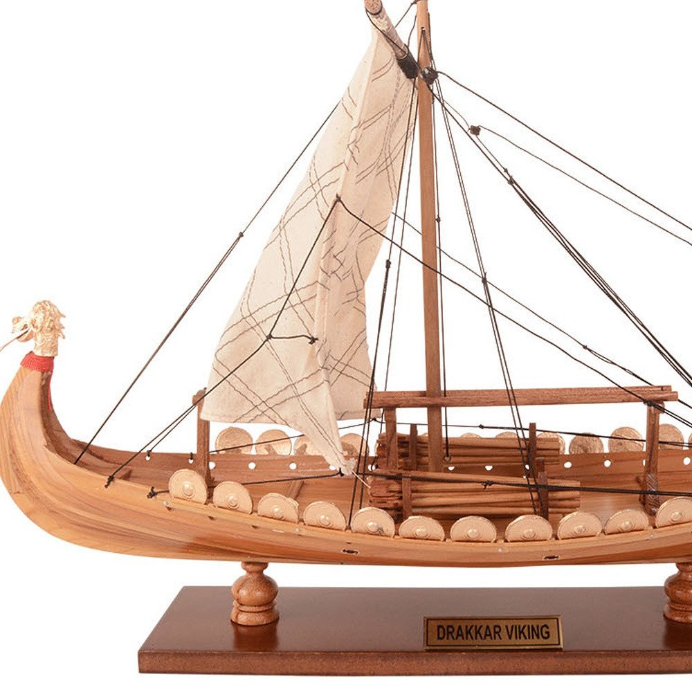 13" Unfinished Wood Hand Painted Model Boat. Home product isolated on a plain white background, finished in cream wood.