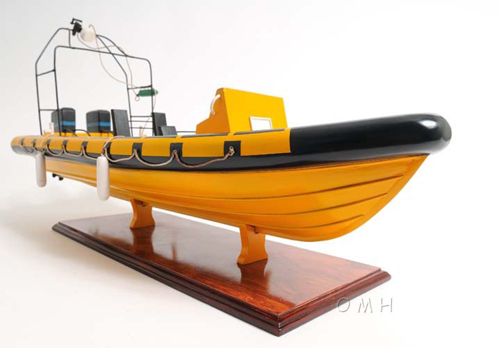 13" Unfinished Wood Hand Painted Model Boat. Home product isolated on a plain white background, finished in orange wood.