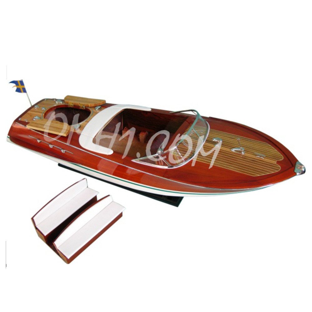10" Unfinished Wood Hand Painted Model Boat. Home product isolated on a plain white background, in a burgundy wood finish.