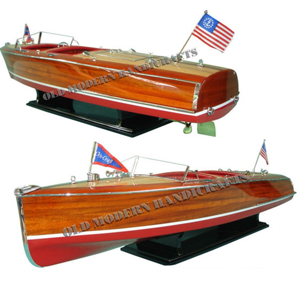 10" Unfinished Wood Hand Painted Model Boat. Home product isolated on a plain white background, in a dark brown wood finish.