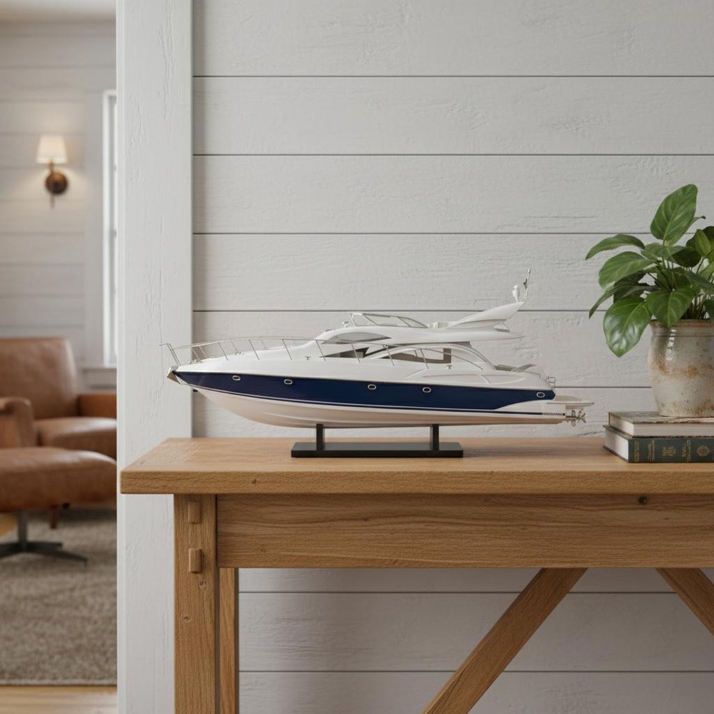 15" Unfinished Wood Hand Painted Model Boat styled in a furnished interior with a light gray wall on a wood floor in light gray wood.