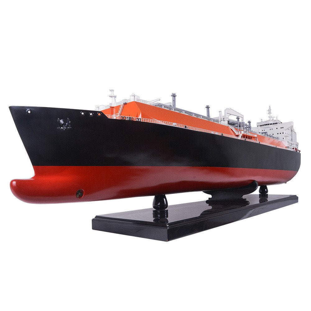 10" Unfinished Wood Hand Painted Model Boat. Home product isolated on a plain white background, showing a black wood surface.