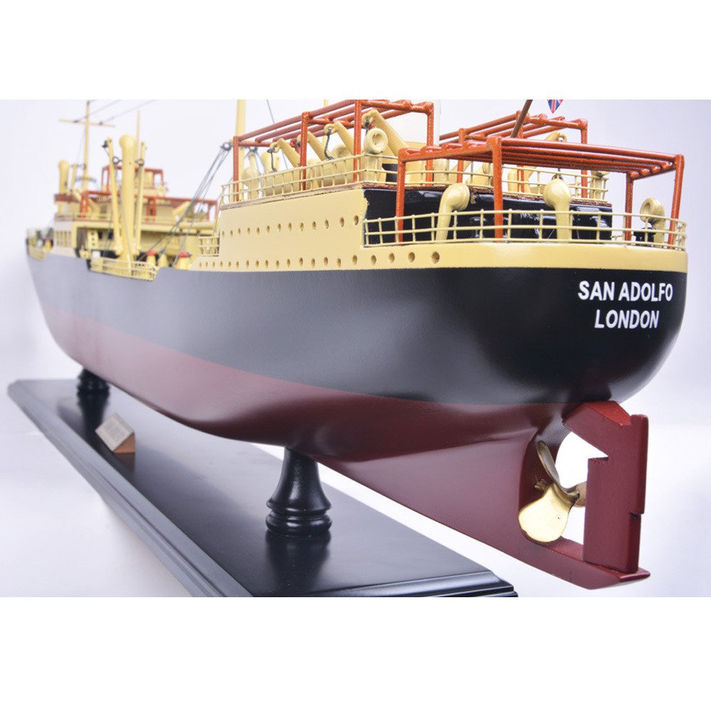 10" Unfinished Wood Hand Painted Model Boat. Home product isolated on a plain white background, showing a blue wood surface.