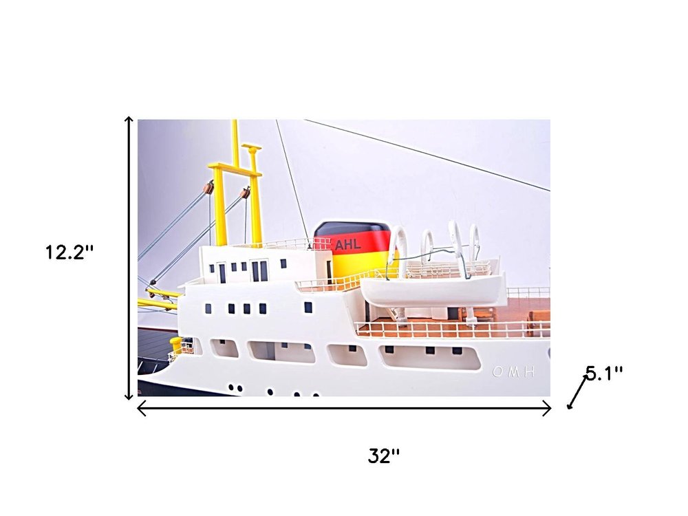12" Unfinished Wood Hand Painted Model Boat. Home product isolated on a plain white background, showing a blue wood surface.