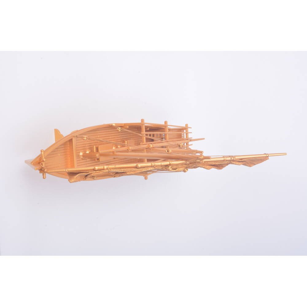 11" Unfinished Wood Hand Painted Model Boat. Home product isolated on a plain white background, finished in tan wood.