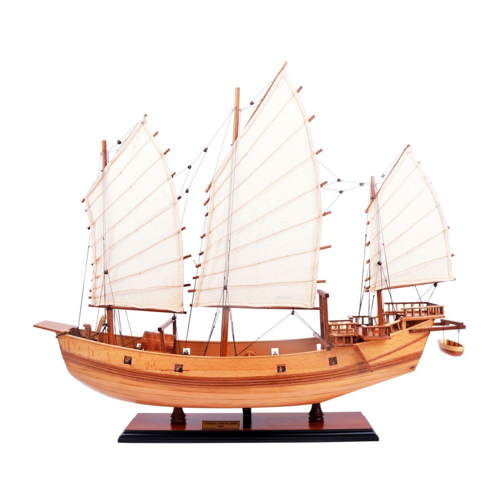 23" Unfinished Wood Hand Painted Model Boat. Home product isolated on a plain white background, showing a orange wood surface.