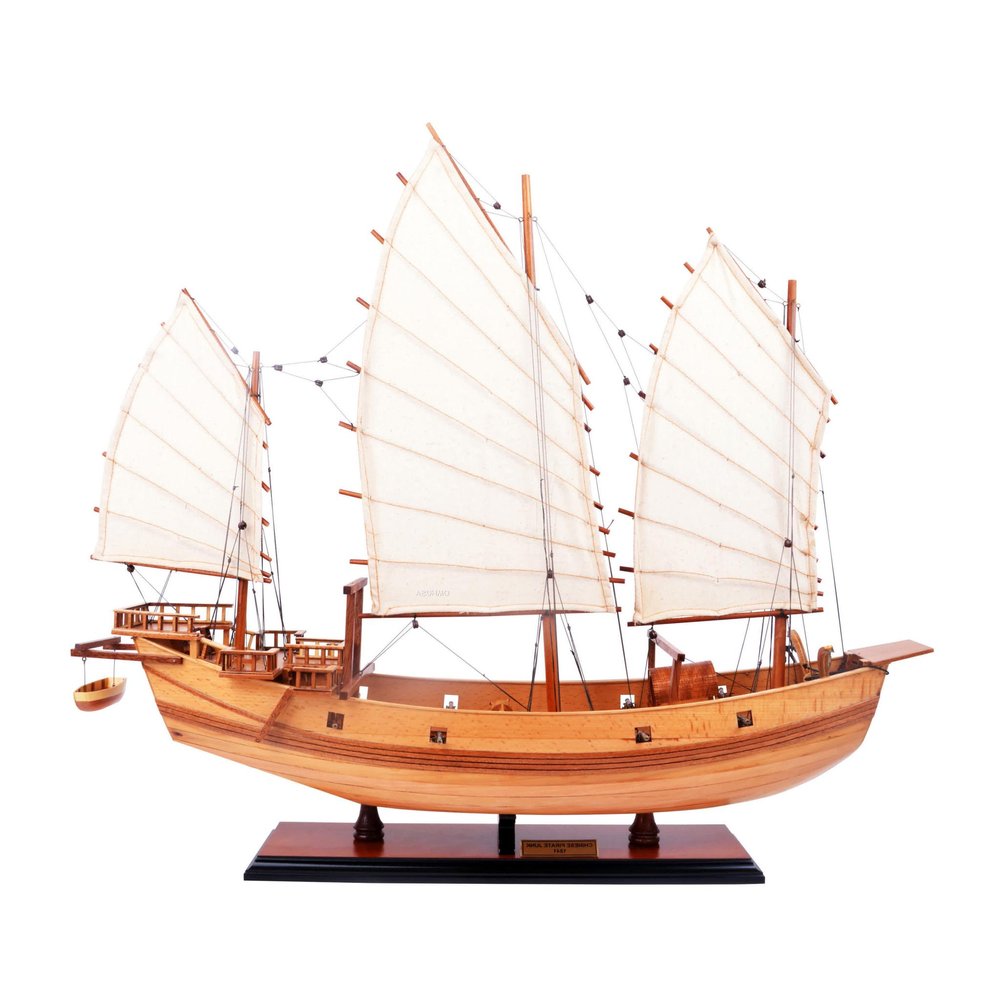 23" Unfinished Wood Hand Painted Model Boat. Home product isolated on a plain white background, showing a orange wood surface.