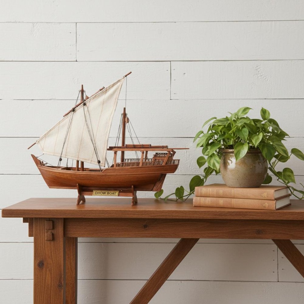 11" Unfinished Wood Hand Painted Model Boat styled in a furnished interior with an off-white wall on a wood floor in dark brown wood.