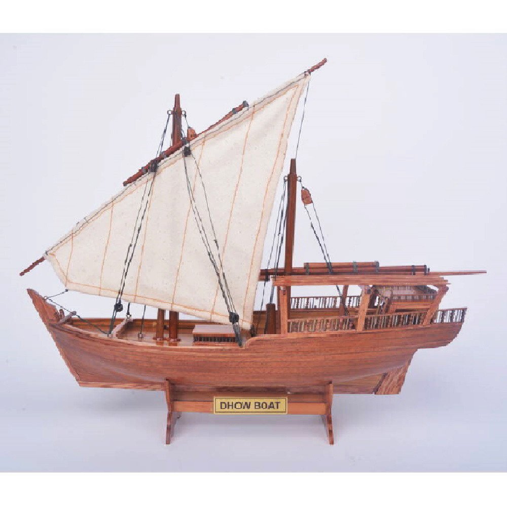 11" Unfinished Wood Hand Painted Model Boat. Home product isolated on a plain white background, in a brown wood finish.