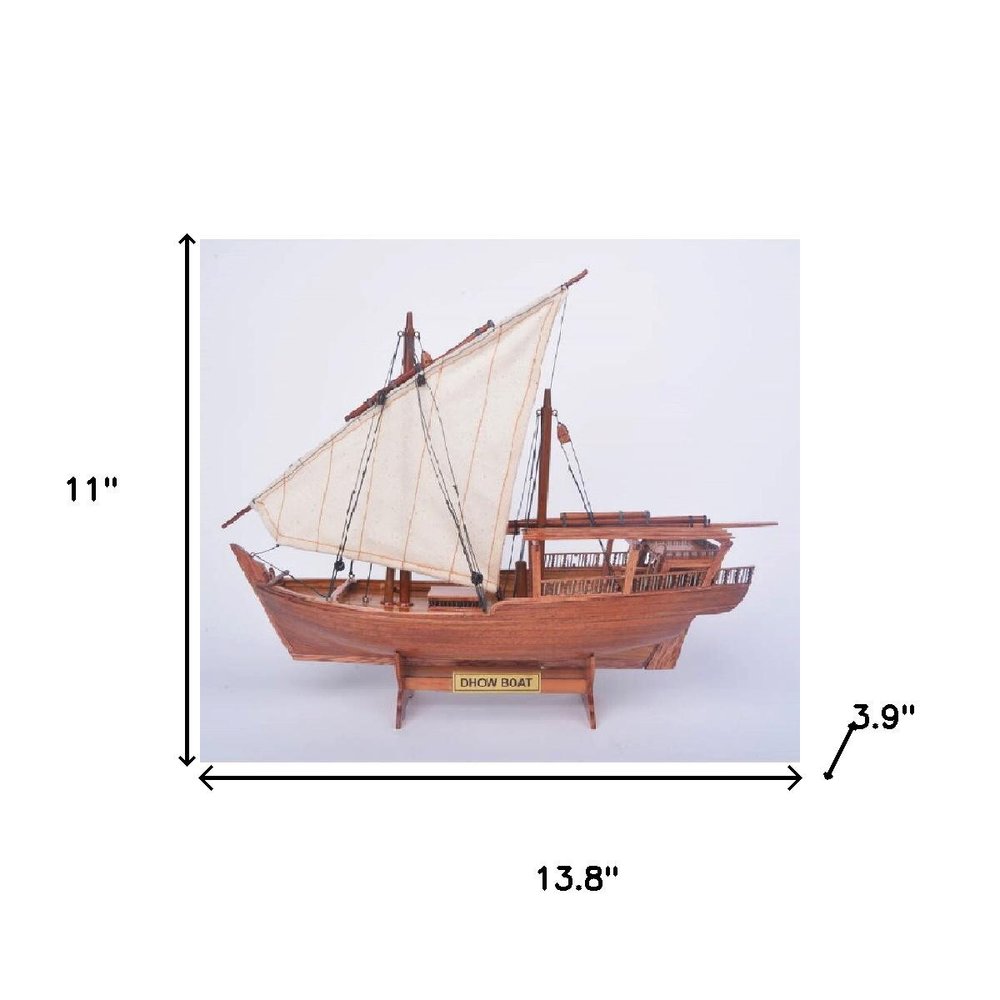 11" Unfinished Wood Hand Painted Model Boat. Home product isolated on a plain white background, finished in brown wood.