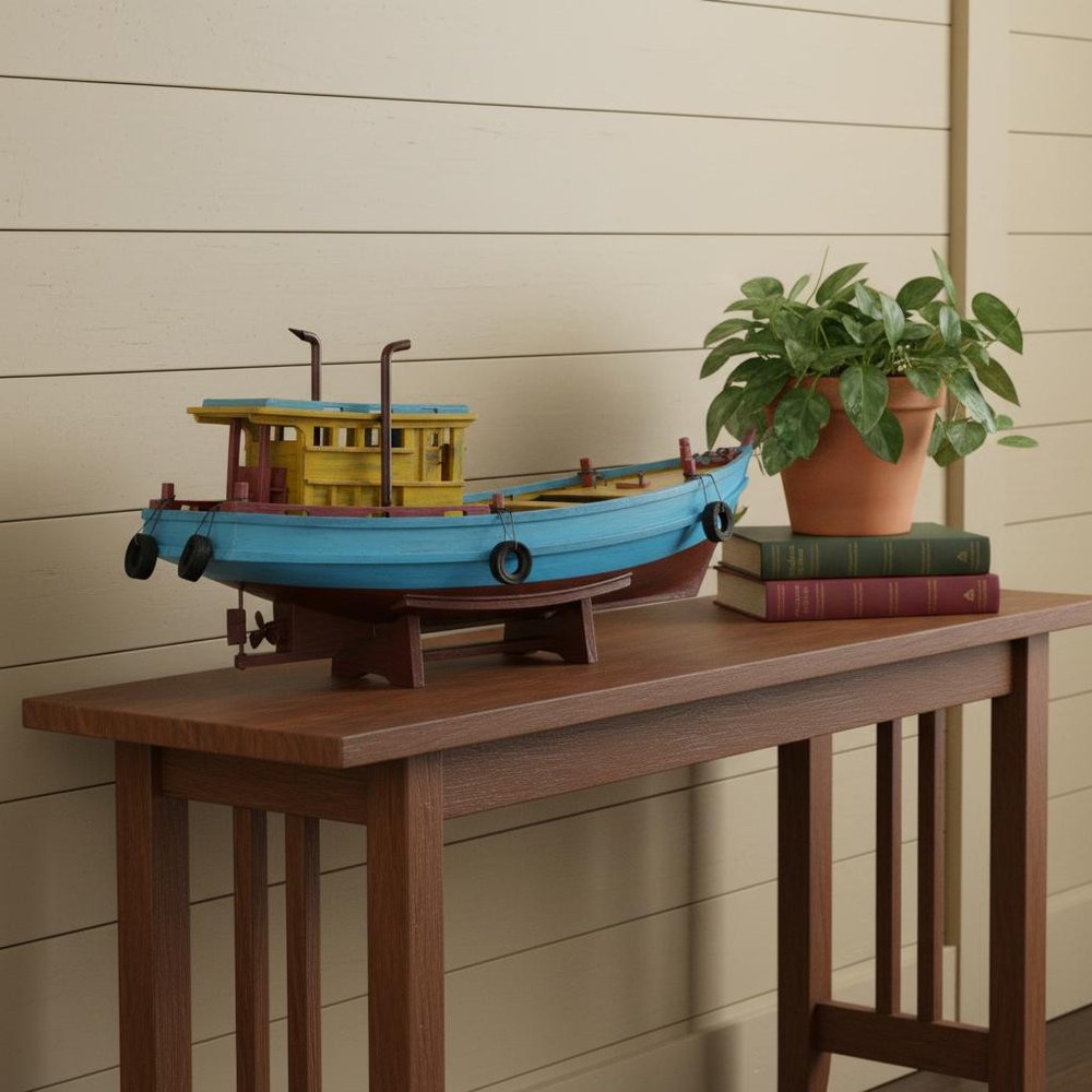13" Unfinished Wood Hand Painted Model Boat styled in a furnished interior with a cream wall on a dark wood floor in dark brown wood.