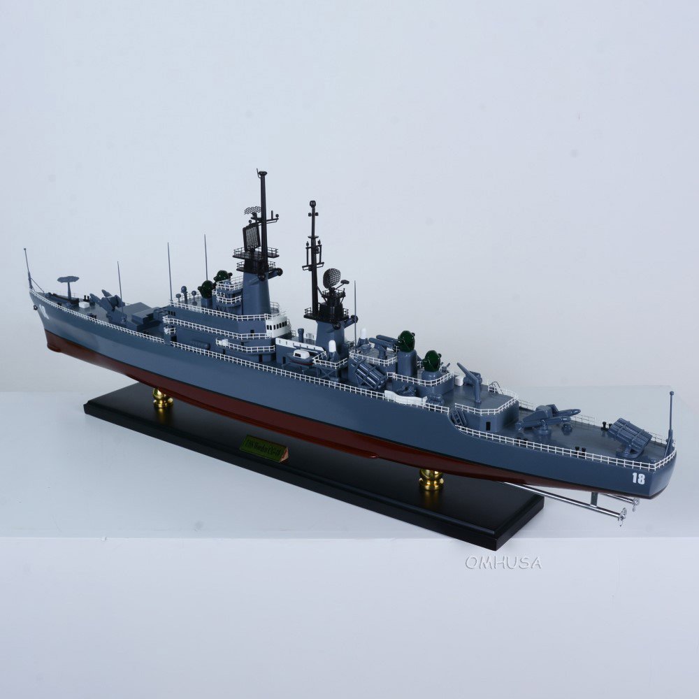 13" Unfinished Wood Hand Painted Model Boat. Home product isolated on a plain white background, finished in blue wood.