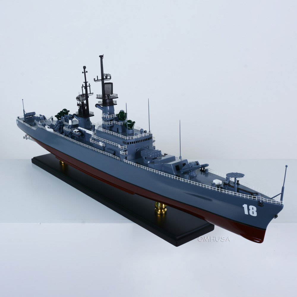 13" Unfinished Wood Hand Painted Model Boat. Home product isolated on a plain white background, finished in blue wood.