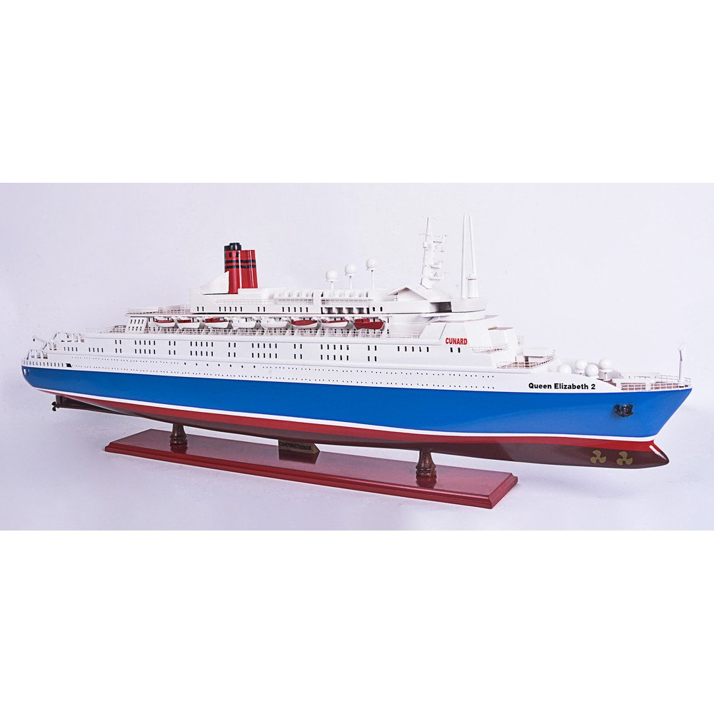 14" Unfinished Wood Hand Painted Model Boat. Home product isolated on a plain white background, showing a blue wood surface.