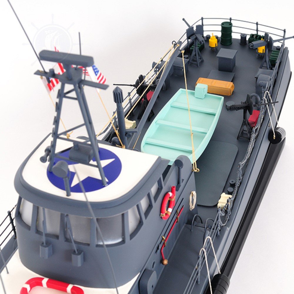 17" Unfinished Wood Hand Painted Model Boat. Home product isolated on a plain white background, finished in blue wood.