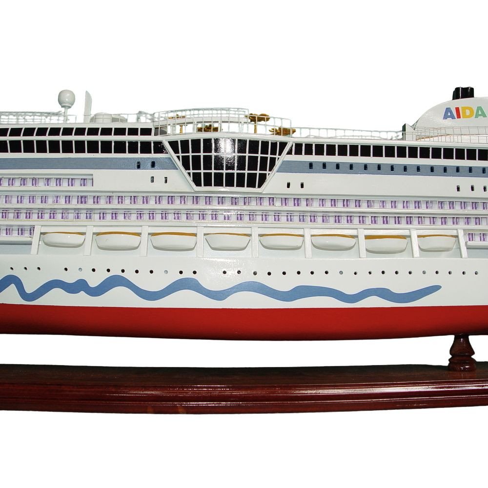 11" Unfinished Wood Hand Painted Model Boat. Home product isolated on a plain white background, finished in light gray wood.