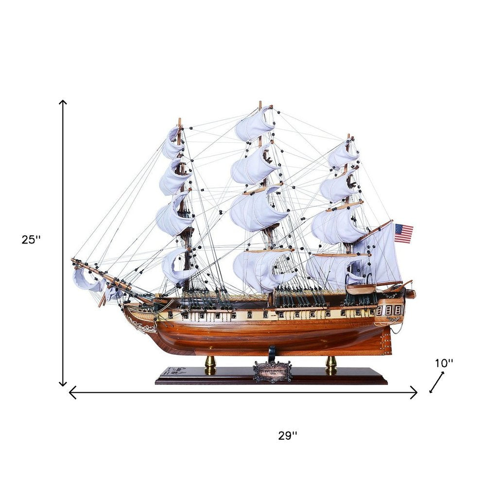 25" Unfinished Wood Hand Painted Model Boat. Home product isolated on a plain white background, finished in blue wood.