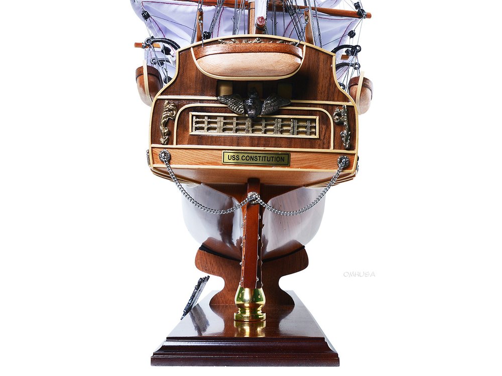 25" Unfinished Wood Hand Painted Model Boat. Home product isolated on a plain white background, in a dark brown wood finish.