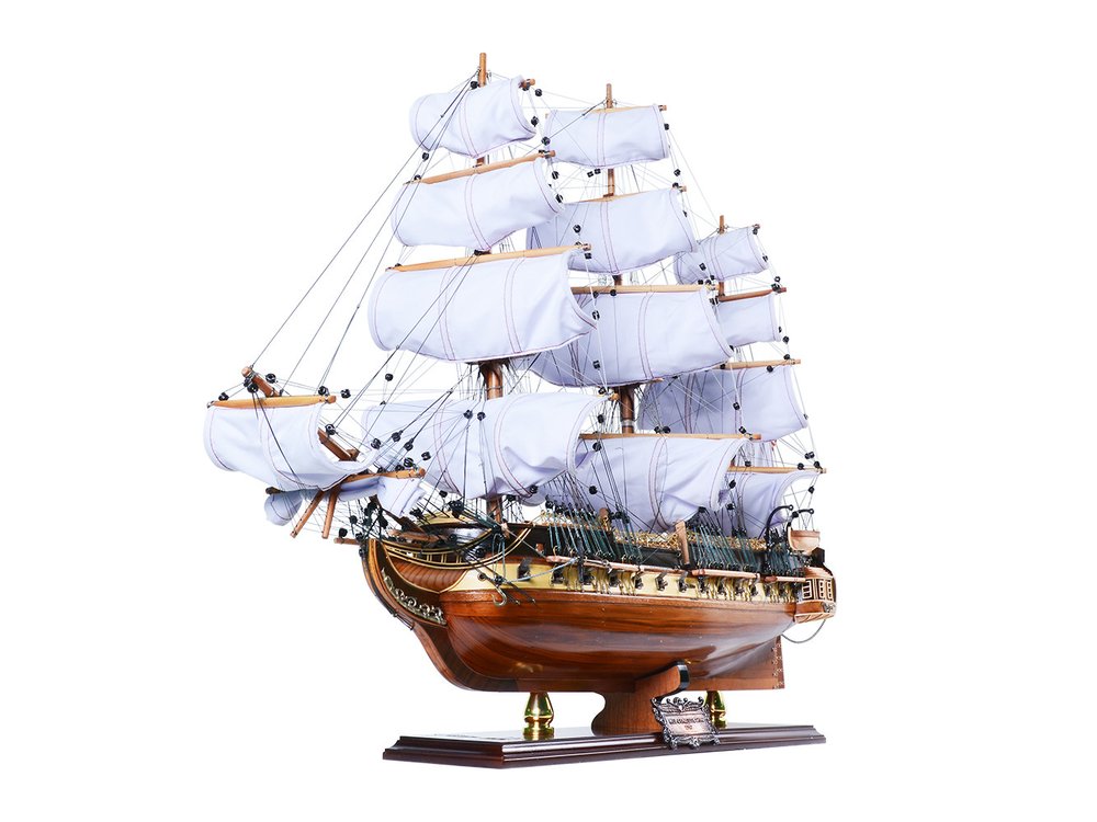 25" Unfinished Wood Hand Painted Model Boat. Home product isolated on a plain white background, showing a blue wood surface.