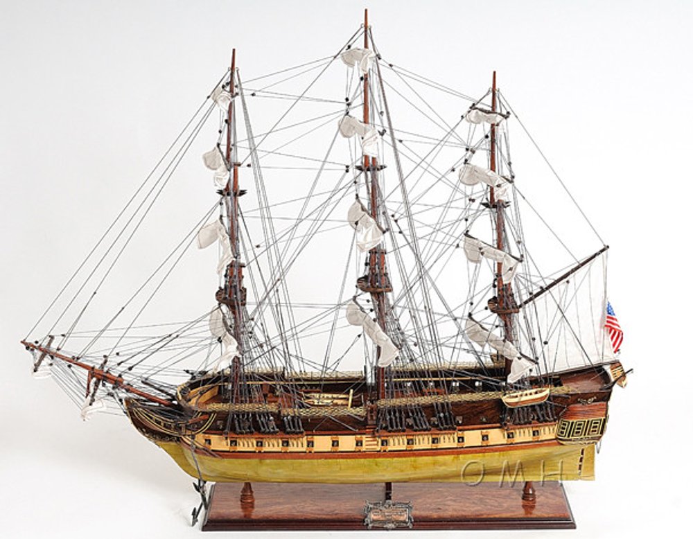 13" Unfinished Wood Hand Painted Model Boat. Home product isolated on a plain white background, in a brown wood finish.