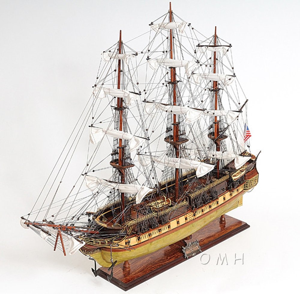 13" Unfinished Wood Hand Painted Model Boat. Home product isolated on a plain white background, finished in light gray wood.