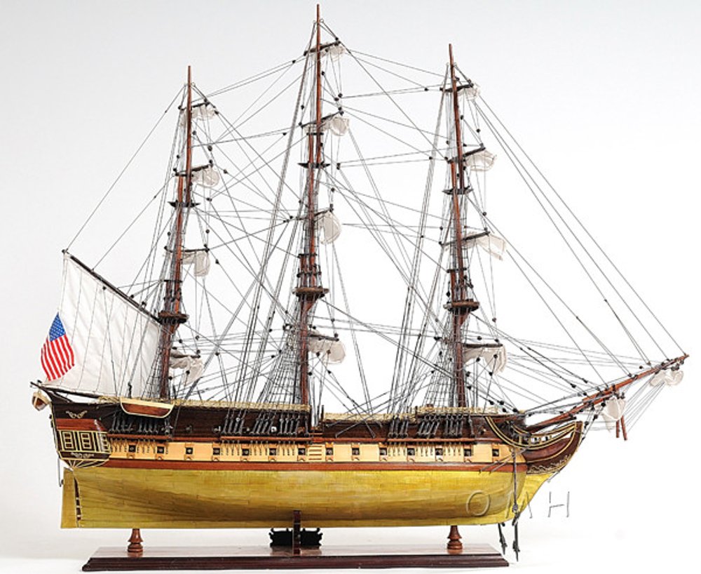 13" Unfinished Wood Hand Painted Model Boat. Home product isolated on a plain white background, finished in light gray wood.