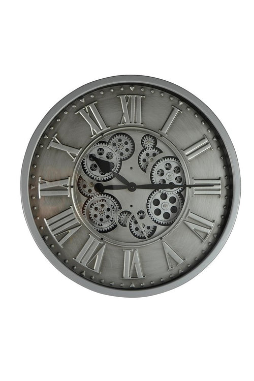 Silver and black metal round wall clock with exposed gears and Roman numerals on a white background.