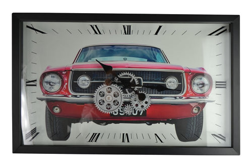 Black framed analog wall clock with a red car image and exposed silver gears.
