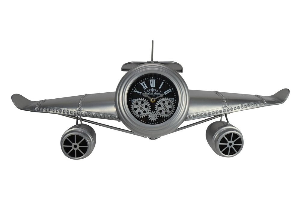 Silver metal airplane wall clock with black face and exposed gears, on a white background.