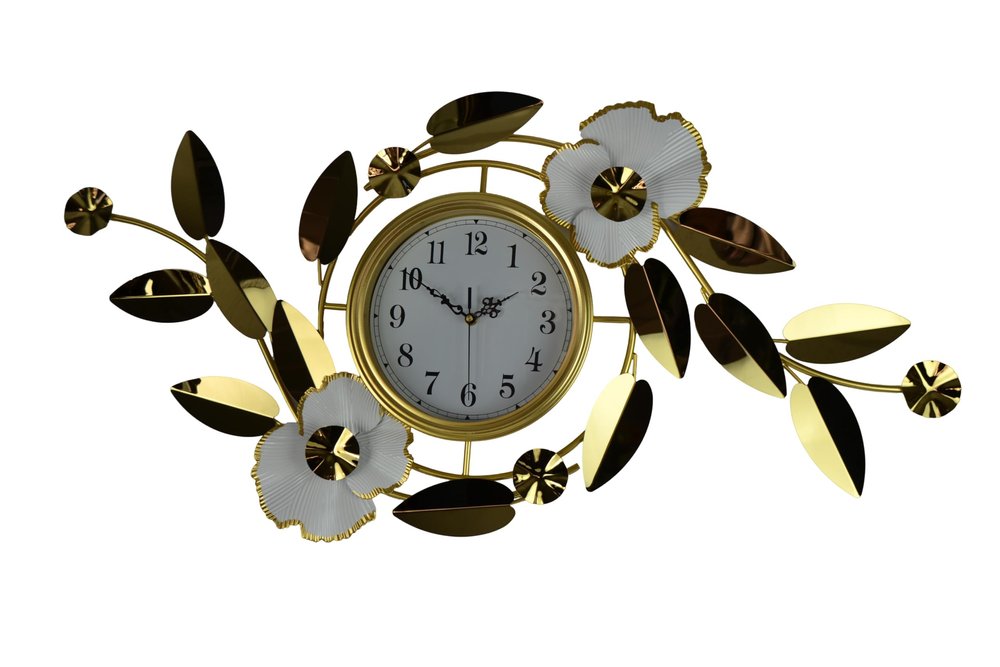 Gold and white metal floral wall clock with analog display on a white background.