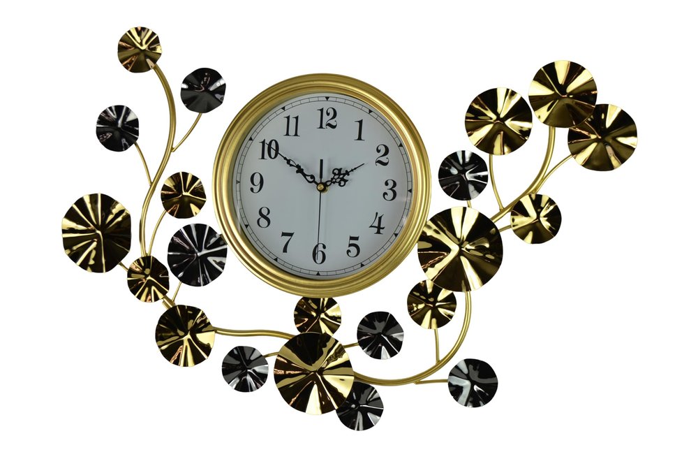 Gold and silver metal wall clock with white face and black floral accents on a white background.