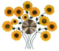 31" Yellow Green And Gold Metal Silent Analog Sunflower Floral Wall Clock. Wall clock isolated on a plain white background, showing a gold metal surface.