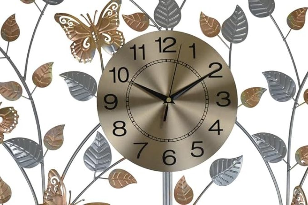 27" Gold Silver And Black Metal Silent Analog Novelty Wall Clock. Wall clock isolated on a plain white background, finished in silver metal.