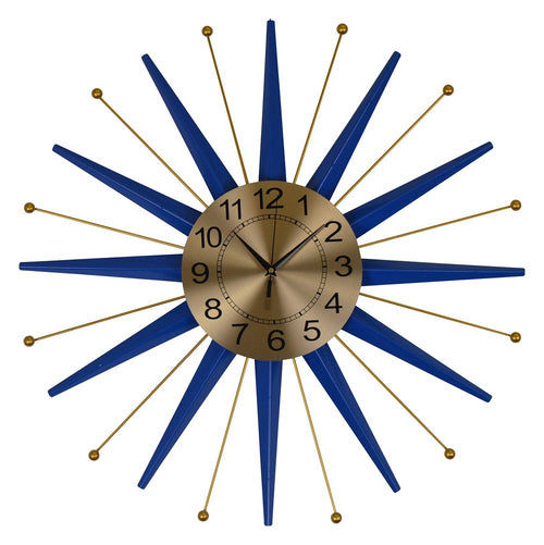 A blue and gold metal starburst wall clock with a brushed gold face and black hands on a white background.