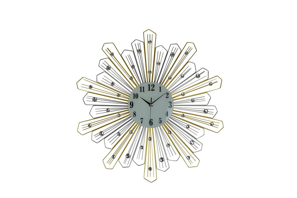Gold and silver sunburst wall clock with faux crystals on a white background.