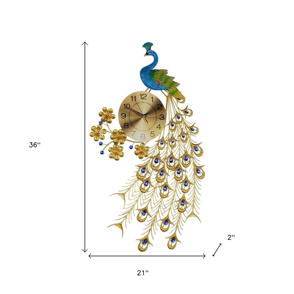 21" Blue Green And Gold Metal Silent Analog Peacock Novelty Wall Clock. Wall clock isolated on a plain white background, in a gold metal finish.