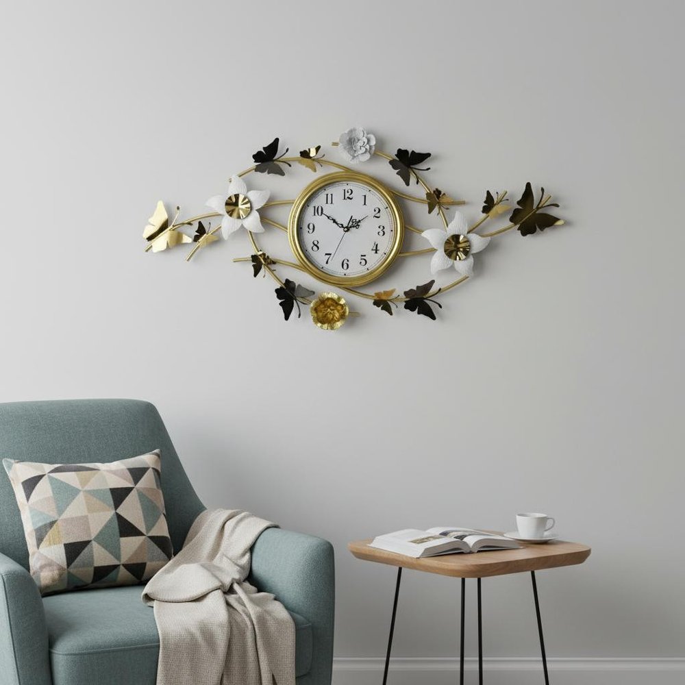 39" Gold And White Metal Silent Analog Butterfly Novelty Wall Clock styled in a furnished interior with a light gray wall on a tiled floor.