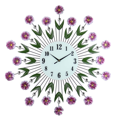 A round white analog wall clock with purple flowers, green leaves, and clear beads on a white background.