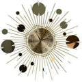 Gold, copper, and silver metal sunburst wall clock with a round analog face and radiating spokes.