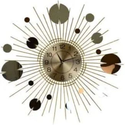 Gold, copper, and silver metal sunburst wall clock with a round analog face and radiating spokes.
