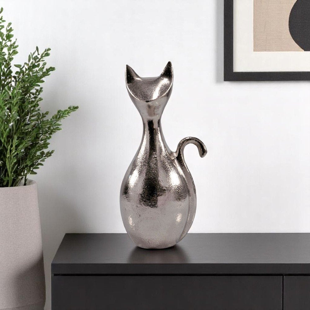 11" Silver Aluminum Cat Tabletop Sculpture. Sculpture in silver metal.