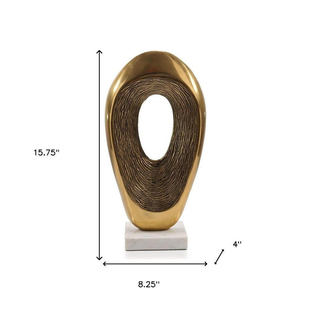 16" Gold And White Aluminum And Marble Abstract Tabletop Sculpture. Sculpture isolated on a plain white background, in a gold metal finish.