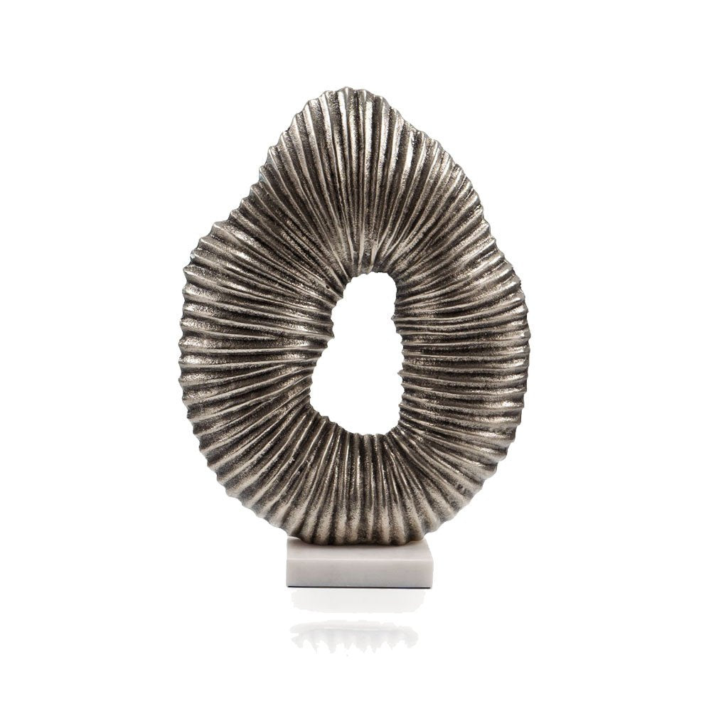 17" Silver And White Aluminum And Marble Tabletop Sculpture. Sculpture isolated on a plain white background, showing a metal surface.