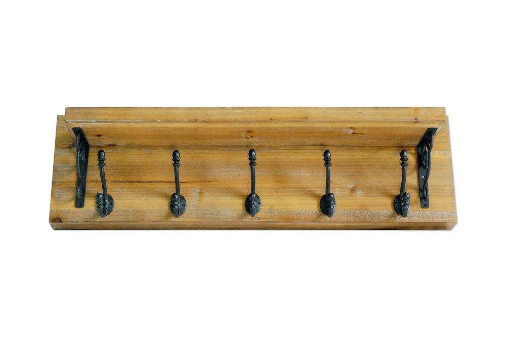 6" Black And Brown Metal And Solid Wood Five Hook Wall Mount Coat Rack. Coat hanger isolated on a plain white background, showing a brown wood surface.