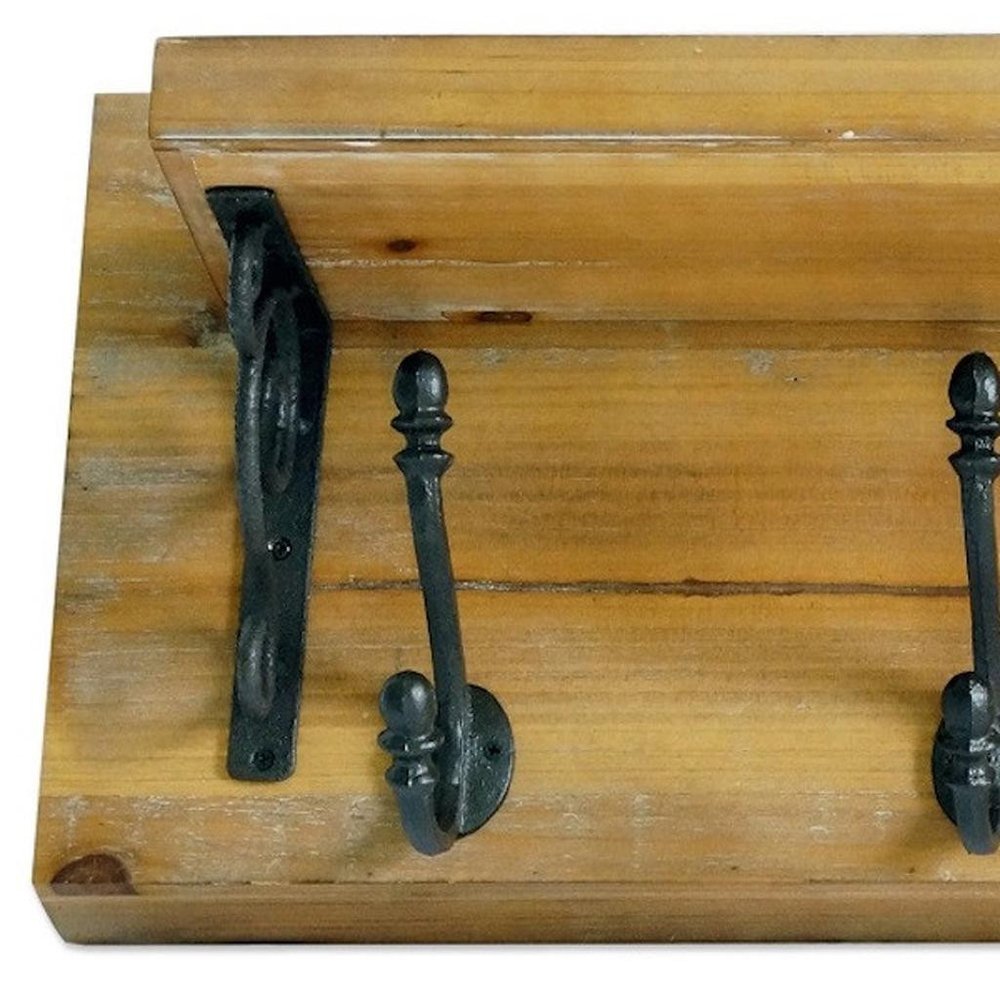 Cropped view of 6" Black And Brown Metal And Solid Wood Five Hook Wall Mount Coat Rack focusing on the brown wood surface.
