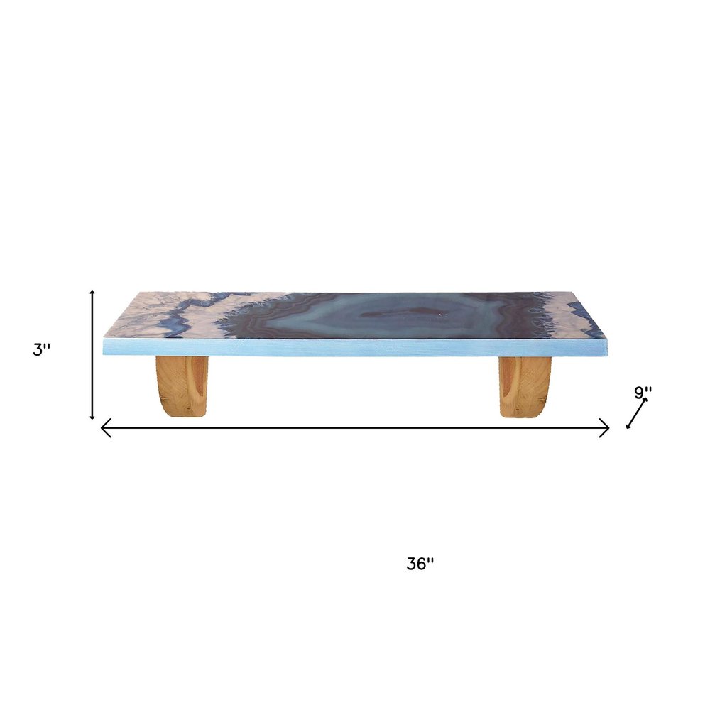 36" Blue And Natural Wood Agate Pattern Wall Mount Accent Shelf. Wall mounted shelve isolated on a plain white background, finished in gray wood.