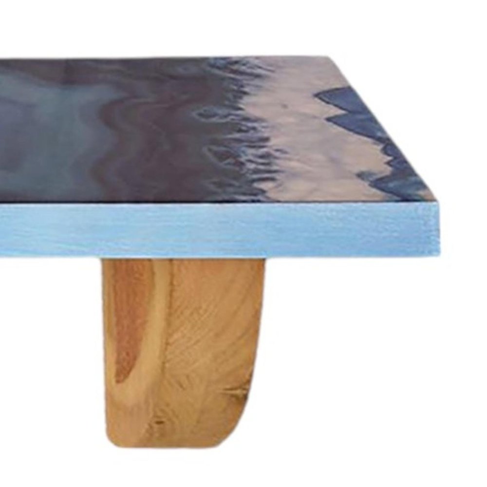 24" Blue And Natural Wood Agate Pattern Wall Mount Accent Shelf. Wall mounted shelve isolated on a plain white background, showing a gray wood surface.